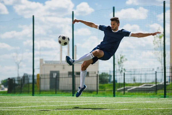 depositphotos 159282460 stock photo soccer player with ball